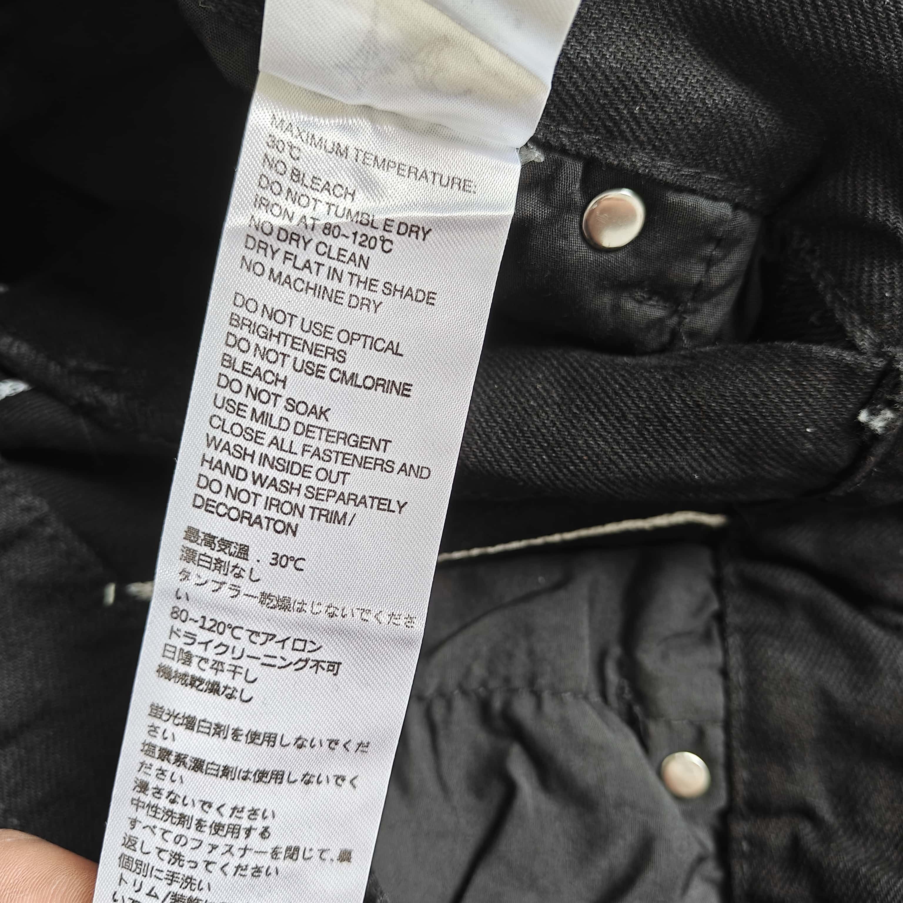 洗水做旧破洞牛仔裤 - 踢 528373 （GZ）