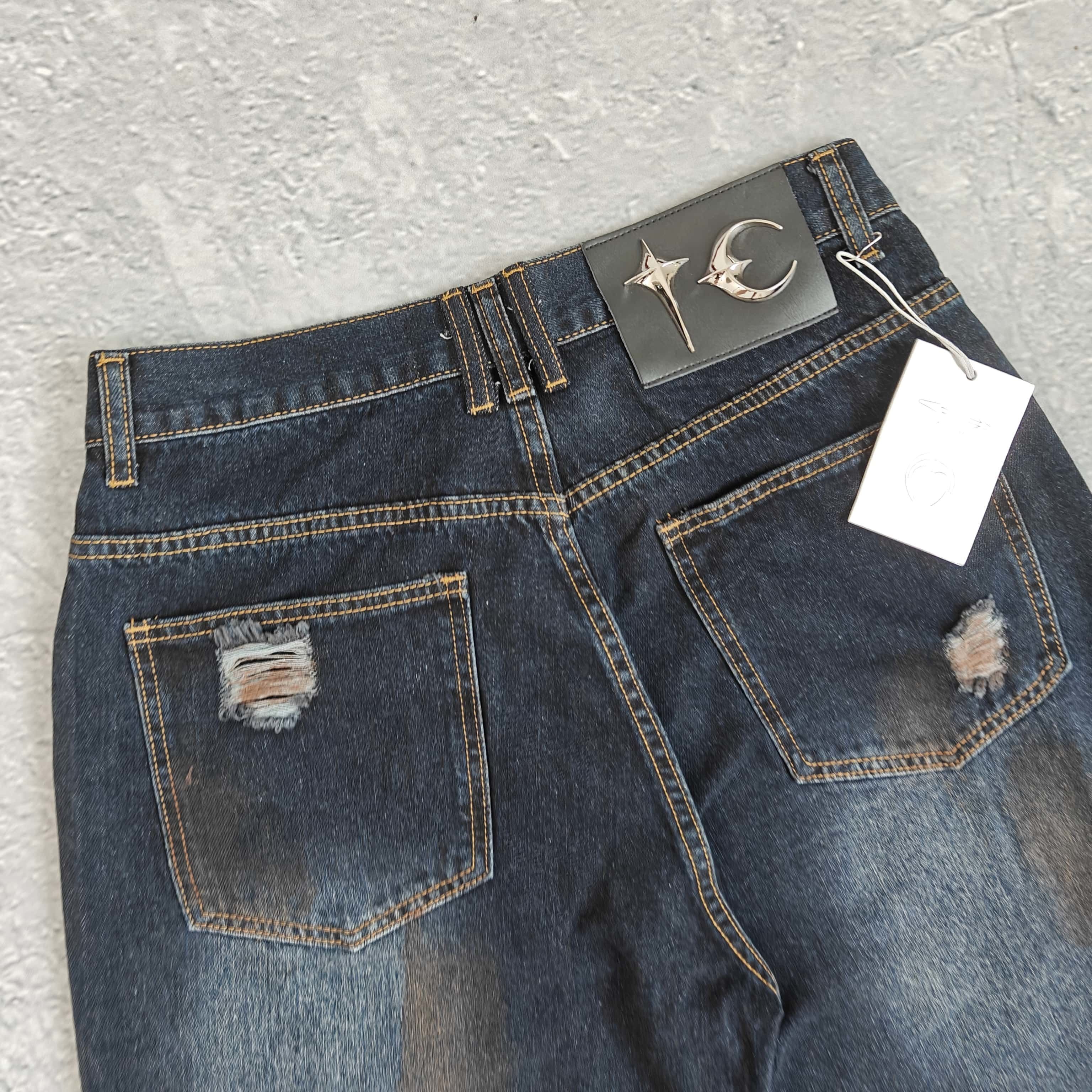 洗水做旧破洞牛仔裤 - 踢 528373 （GZ）