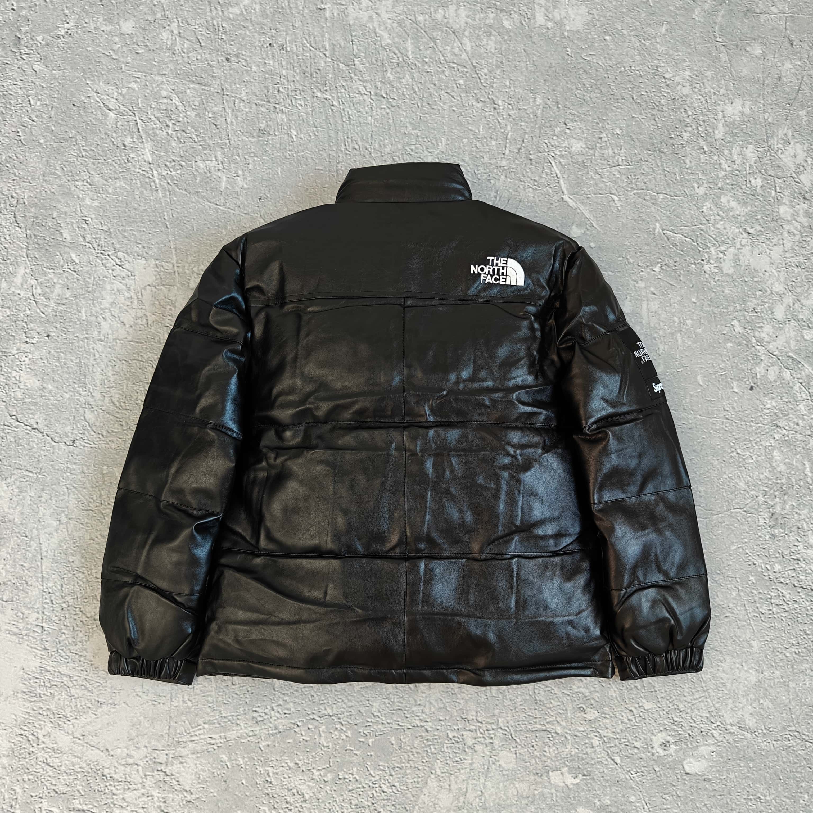 黑色皮质羽绒服-背 528970